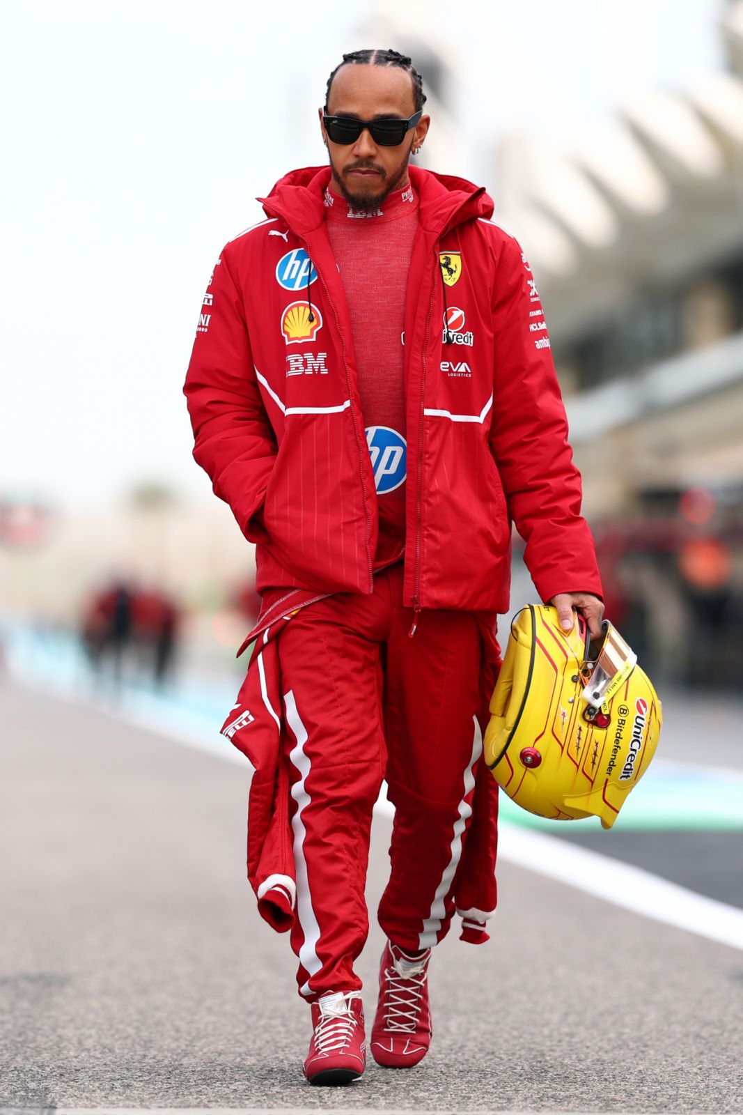 Lewis Hamilton of Great Britain and Scuderia Ferrari walks in the Pitlane.(Photo:Getty Images)