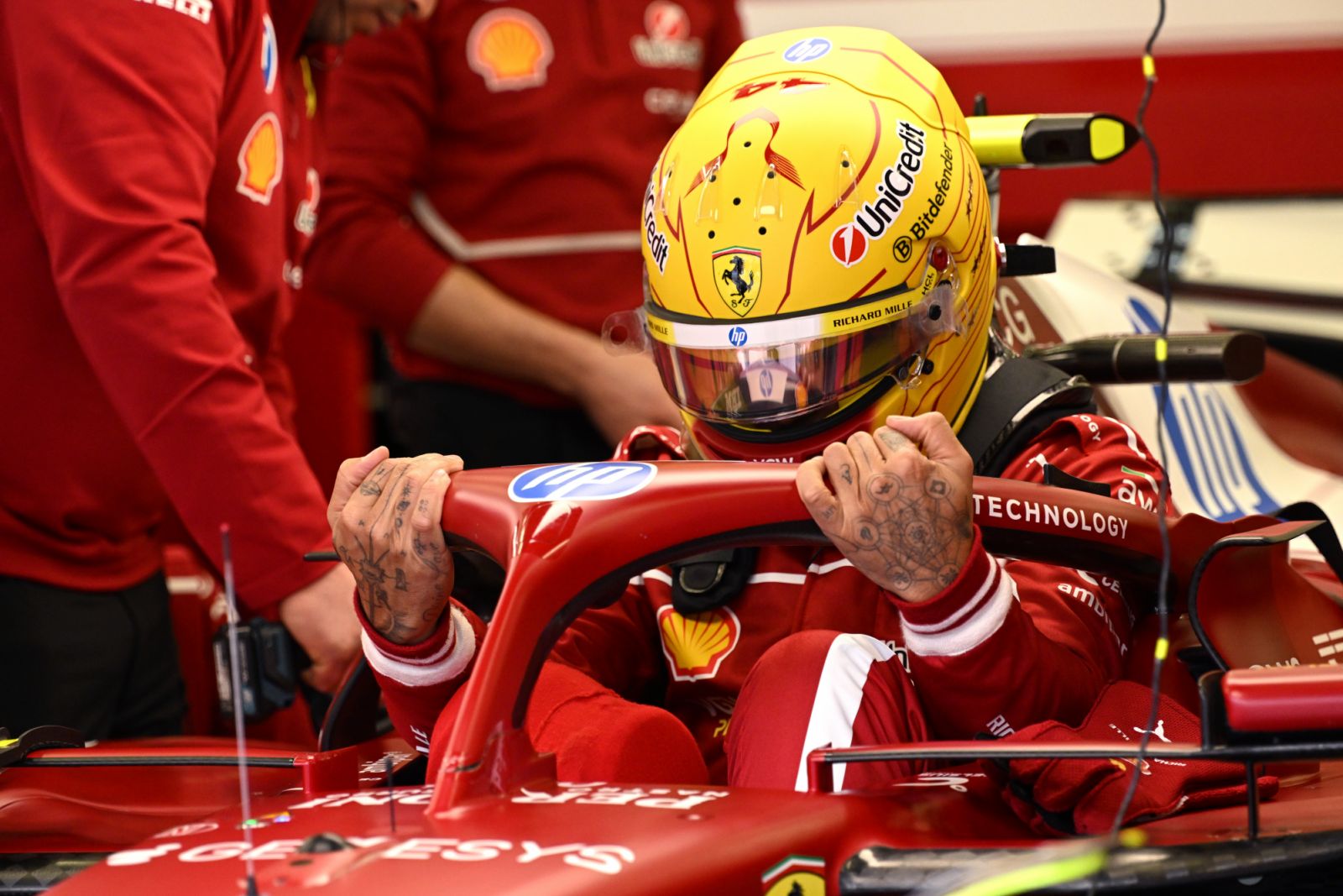 Lewis Hamilton of Great Britain and Scuderia Ferrari prepares to drive the car.(Photo:Getty Images)