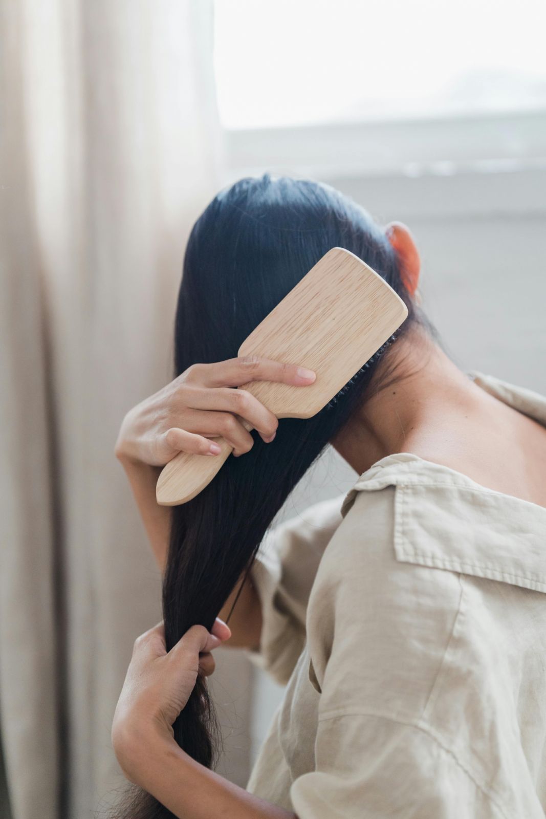 In this article, Tatler tells you how to take care of your low or high porosity hair (Photo: Greta Hoffman/Pexels)