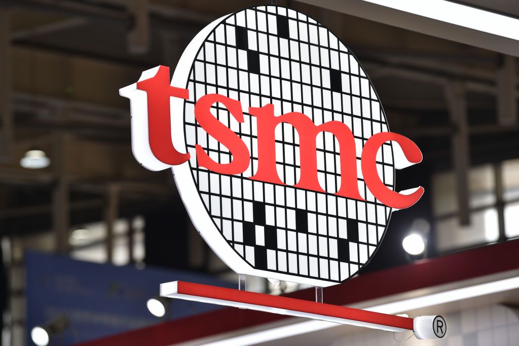 NANJING, CHINA - AUGUST 18, 2022 - (FILE)The LOGO of Taiwan Semiconductor Industry at the 2022 World Semiconductor Congress in Nanjing, Jiangsu province, Aug 18, 2022. On January 12, 2023, TSMC released its fourth quarter earnings report, with revenue of 138.868 billion yuan and net profit of about 65.69 billion yuan. (Photo credit should read CFOTO/Future Publishing via Getty Images)