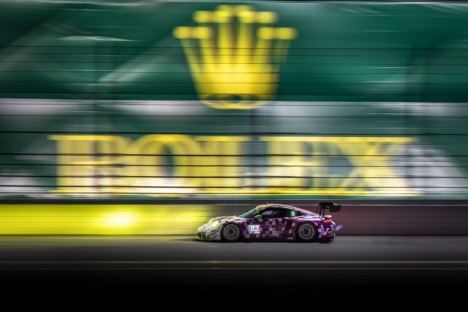 The Iron Dames Porsche 911 GT3 R speeds through the backstretch during the 2025 Rolex 24 at Daytona.
#83 Iron Dames, Porsche 911 GT3 R (992), GTD; Sarah Bovy (BEL), Rahel Frey (SWZ), Michelle Gatting (DNK), Karen Gaillard (CHE)