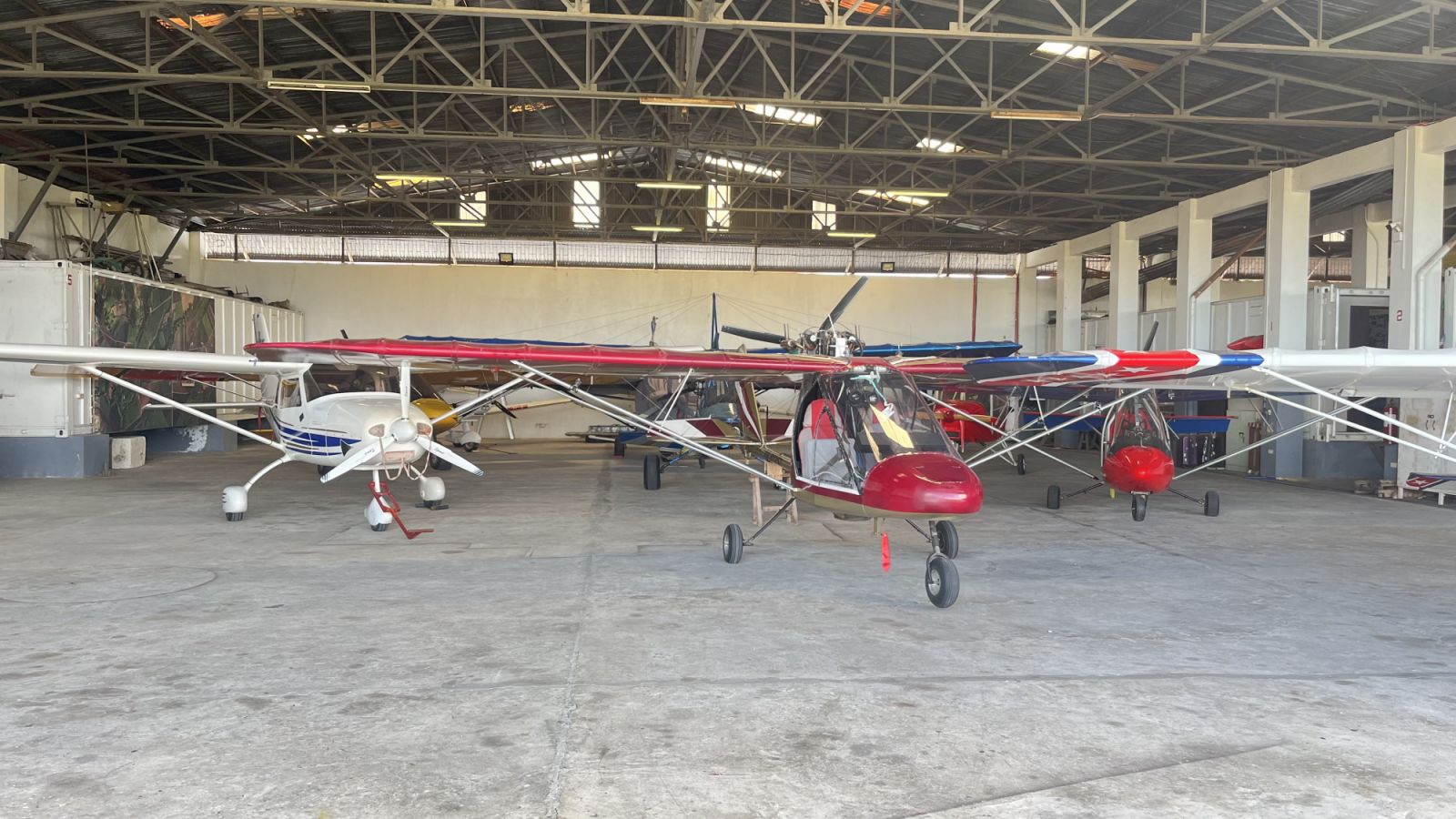 Privately owned planes in one of the hangars at the Angeles City Flying Club (Photo: Gabriel Bohol)