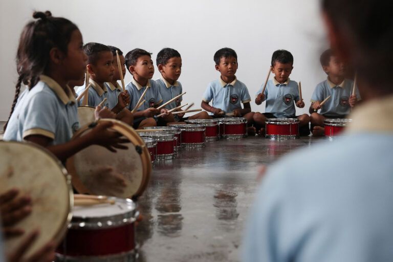 Engaging in a holistic, musical education at the Smiling Gecko Campus in Sameakki Mean Chey District of Cambodia (Photo: Smiling Gecko Website)