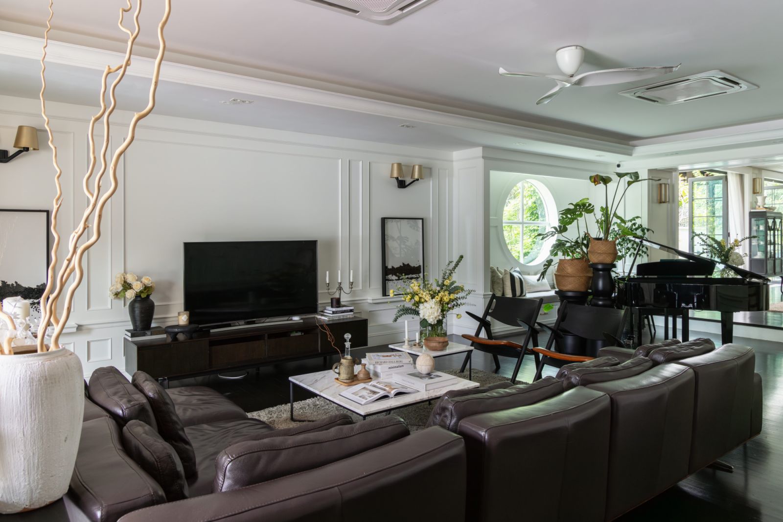 Natural light floods the living area through carefully positioned windows