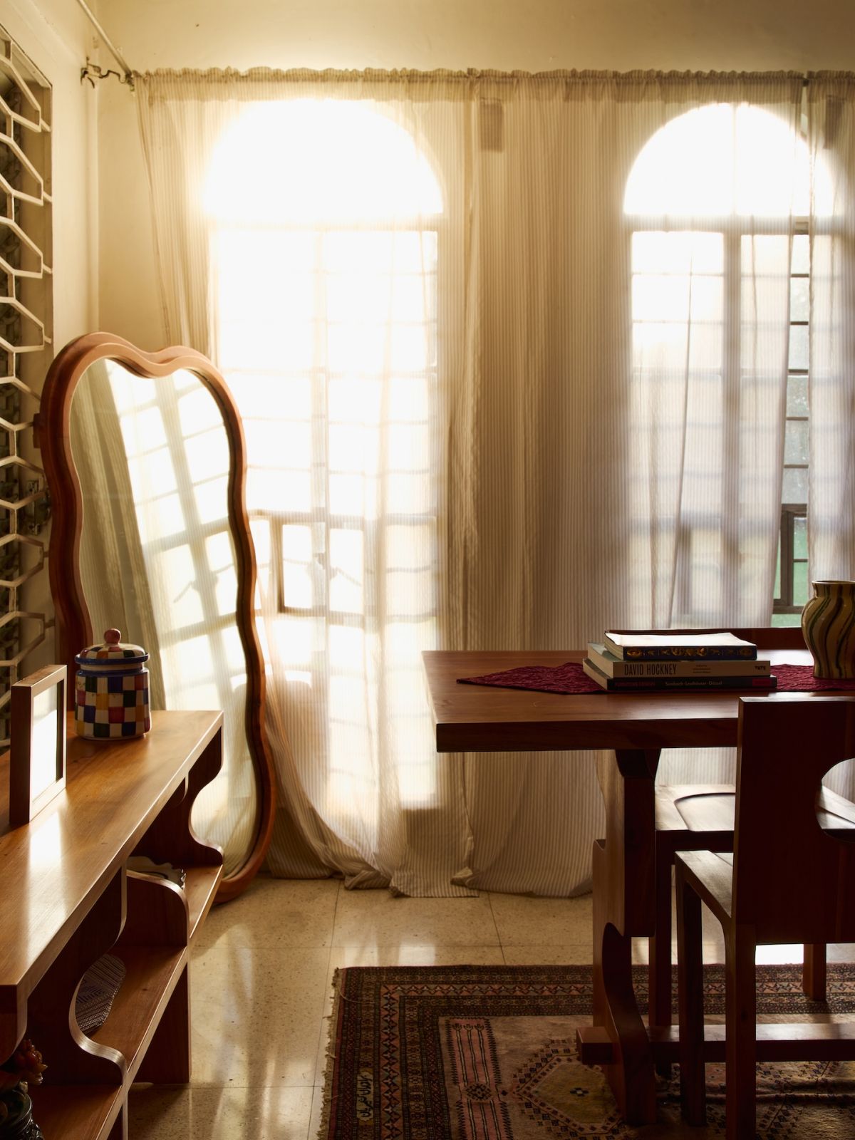 Afternoon light spilling in through the curtains of this Marikina home