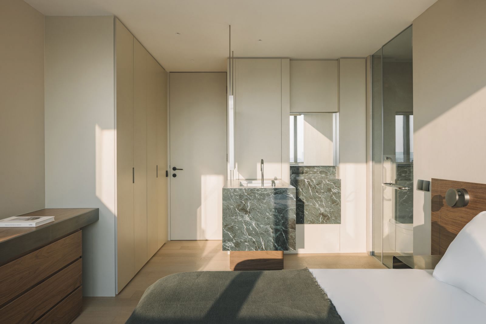 The bedroom and open-concept bathroom design