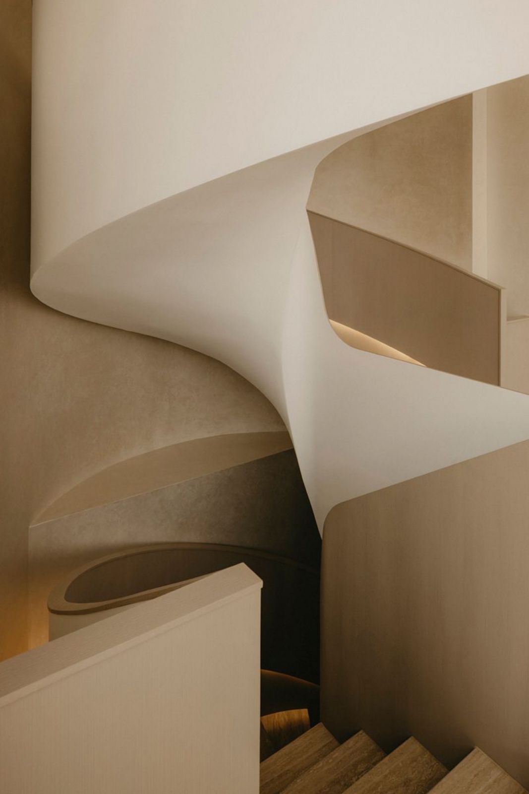 Fabricated by HG Group, this sculptural staircase drew inspiration from the Singapore Apple store