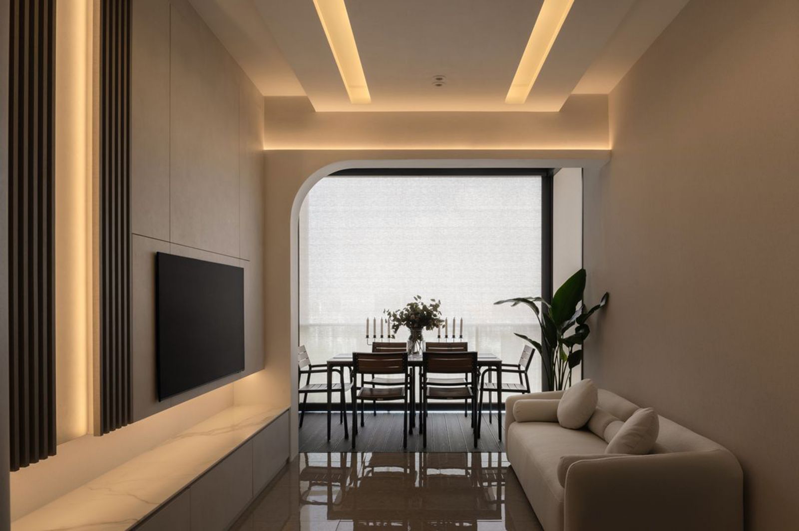 Lighting plays a pivotal role in creating a cosy ambience in this minimalist home by Twothree Design