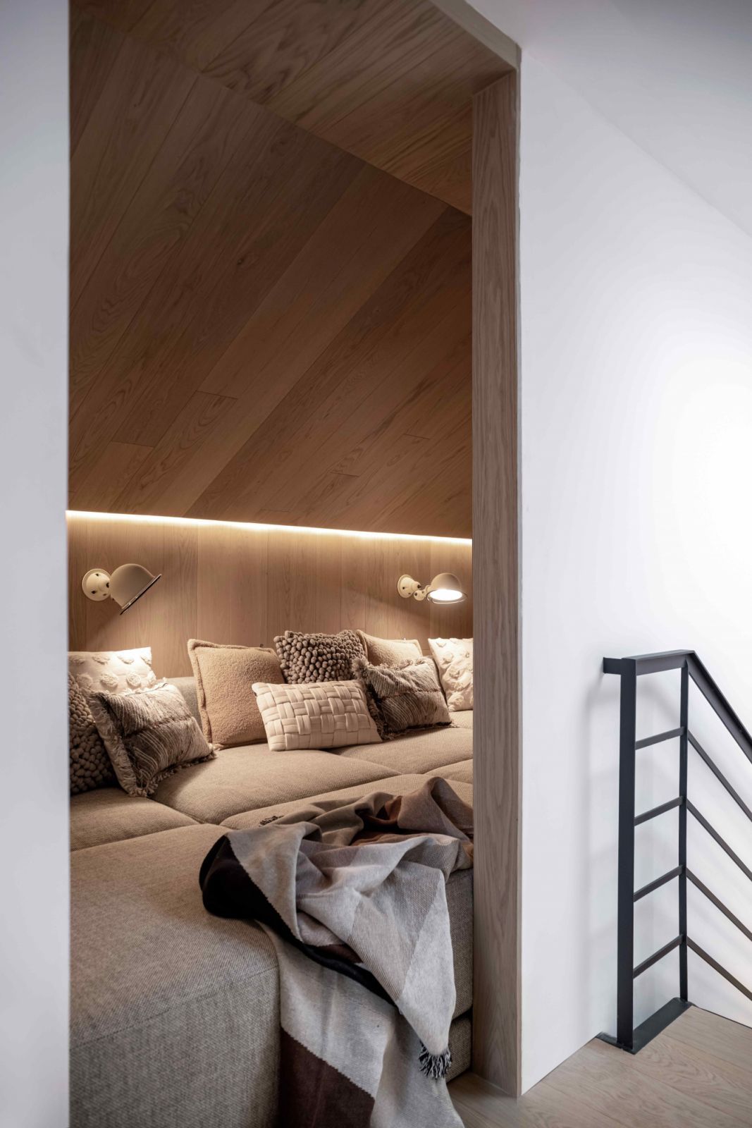 Plush furnishings in Nivek Remas’ church conversion loft as an additional play space (Photo: Scott Norsworthy)