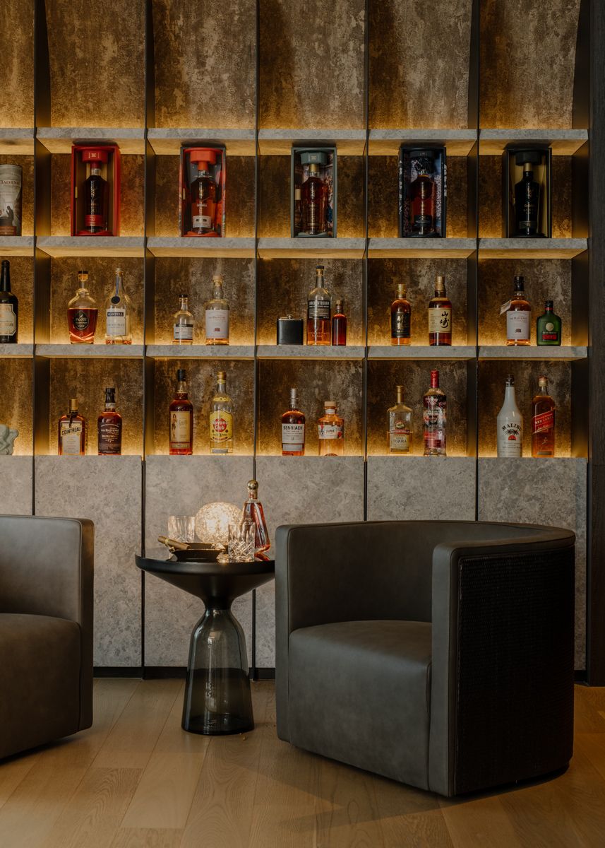 A corner of the Orchard Road apartment's living area was transformed into a dedicated space for enjoying whisky