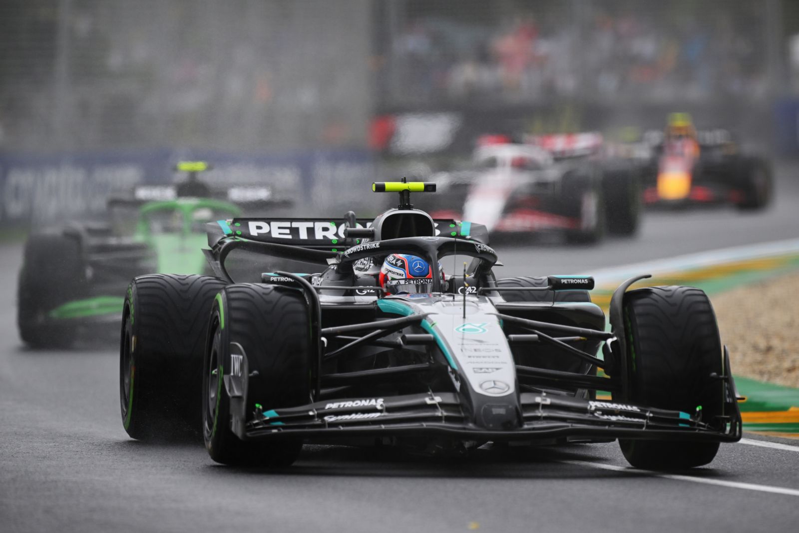 MELBOURNE, AUSTRALIA - MARCH 16: Andrea Kimi Antonelli of Italy driving the (12) Mercedes AMG Petronas F1 Team W16 leads Gabriel Bortoleto of Brazil driving the (5) Kick Sauber C45 Ferrari on track during the F1 Grand Prix of Australia at Albert Park Grand Prix Circuit on March 16, 2025 in Melbourne, Australia. (Photo by Clive Mason/Getty Images)