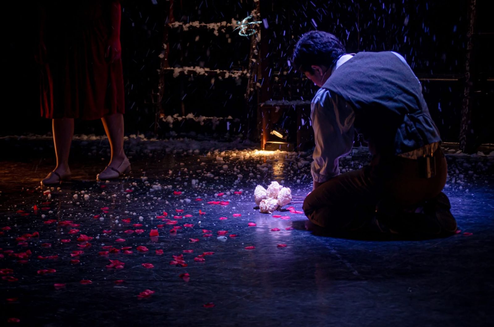 Billy grieving Nena’s death (Photo: Courtesy of the FEU Theatre Guild)