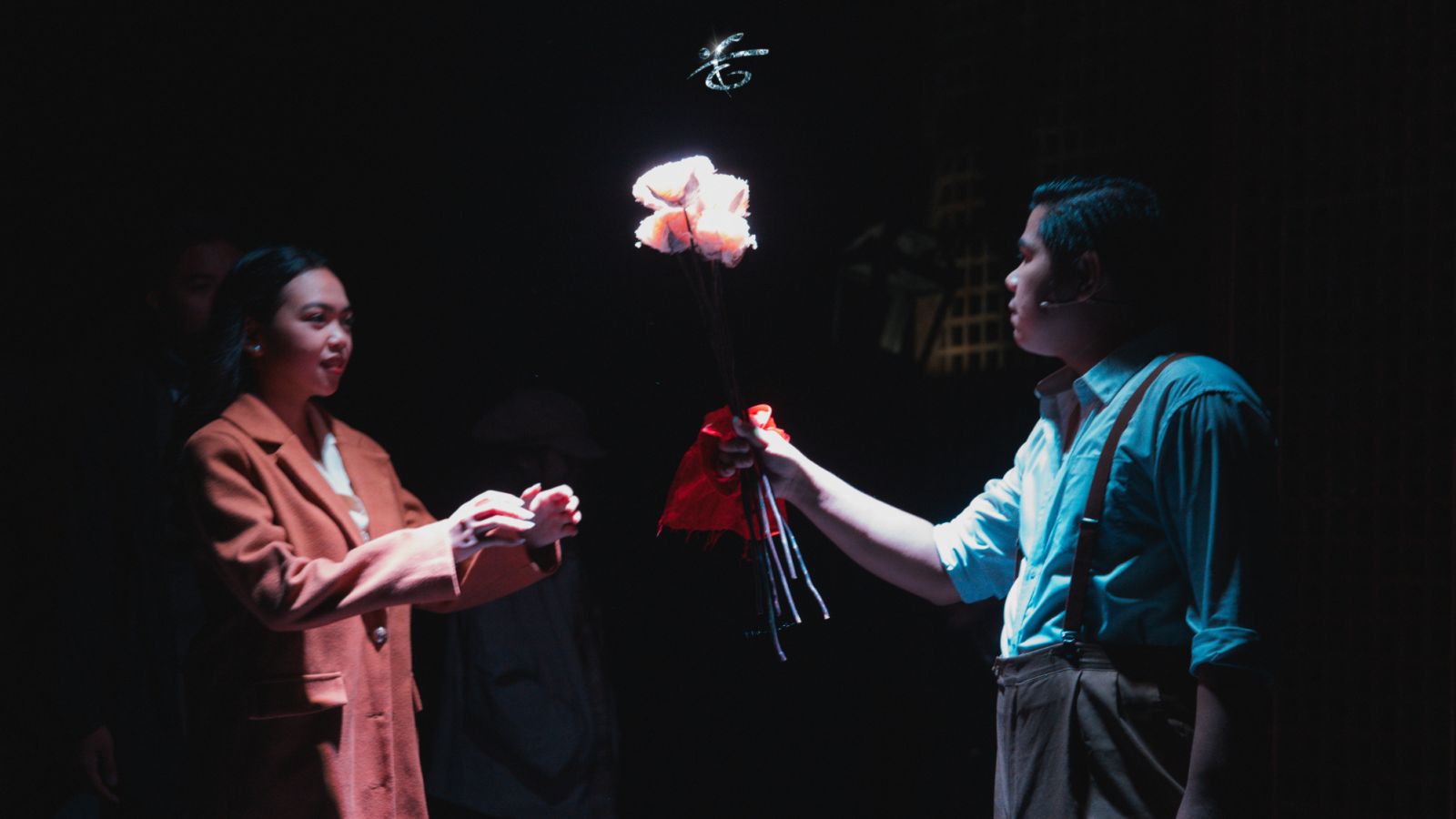 Nena and the Narrator in the FEU Theatre Guild’s ‘Niyebe’ (Photo: Courtesy of the FEU Theatre Guild)