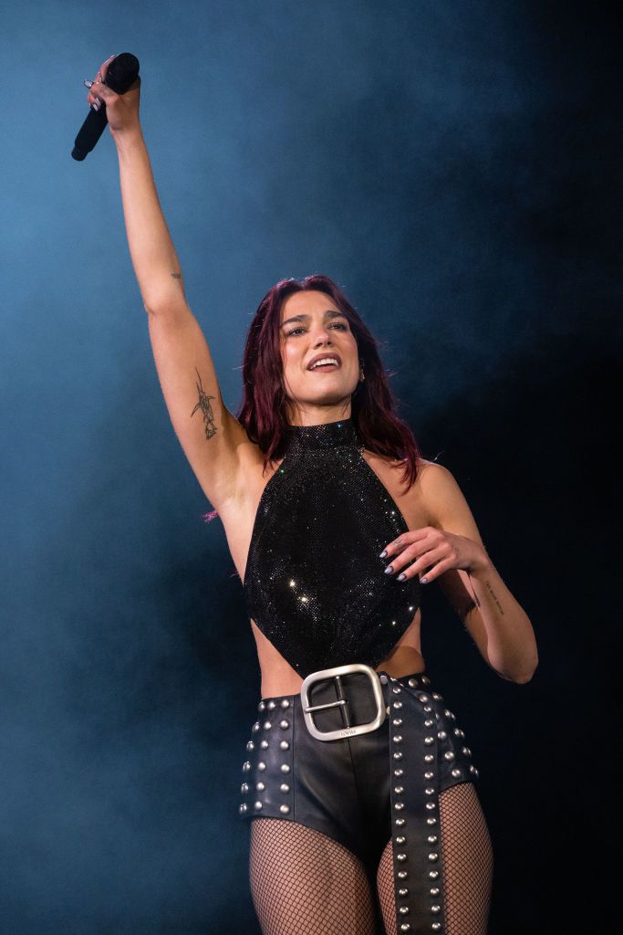 GLASTONBURY, ENGLAND - JUNE 28: Dua Lipa headlines The Pyramid Stage during day three of Glastonbury Festival 2024 at Worthy Farm, Pilton on June 28, 2024 in Glastonbury, England. Founded by Michael Eavis in 1970, Glastonbury Festival features around 3,000 performances across over 80 stages. Renowned for its vibrant atmosphere and iconic Pyramid Stage, the festival offers a diverse lineup of music and arts, embodying a spirit of community, creativity, and environmental consciousness. (Photo by Harry Durrant