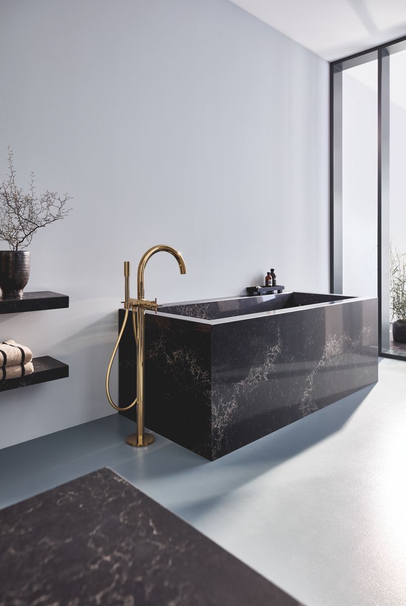 Grohe Spa Atrio Private Collection floor-mounted bath mixer paired with Caesarstone bath tub