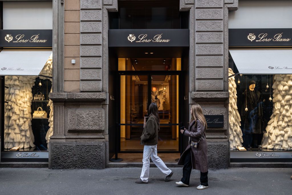 MILAN, ITALY - NOVEMBER 21: People stroll past the Italian luxury fashion house Loro Piana flagship store, located in Via Monte Napoleone, on November 21, 2024 in Milan, Italy. Featuring prime rents of 20,000 euros per square metre per year, Milan's Via Monte Napoleone has been named the world's most expensive shopping street by a report released by American global commercial real estate services firm Cushman & Wakefield Inc. Via Monte Napoleone, part of the so called “Quadrilatero della Moda” shopping dist