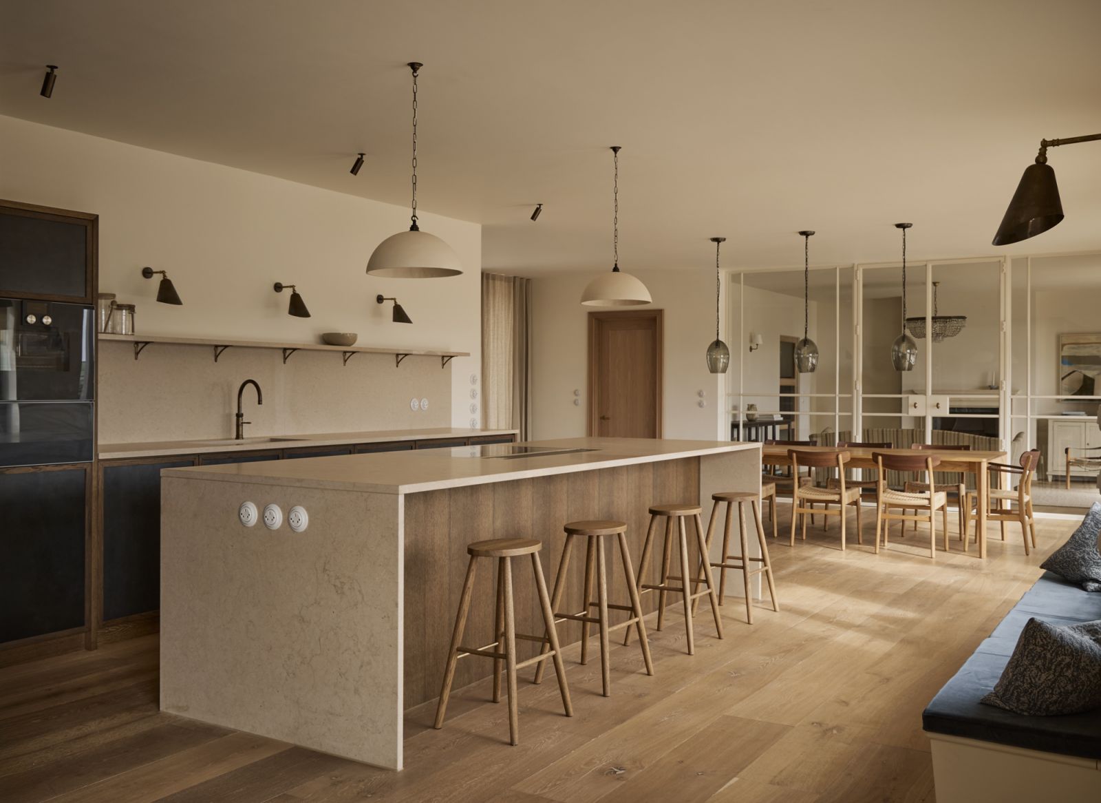 The bespoke limestone island is reminiscent of the rocky coastline nearby