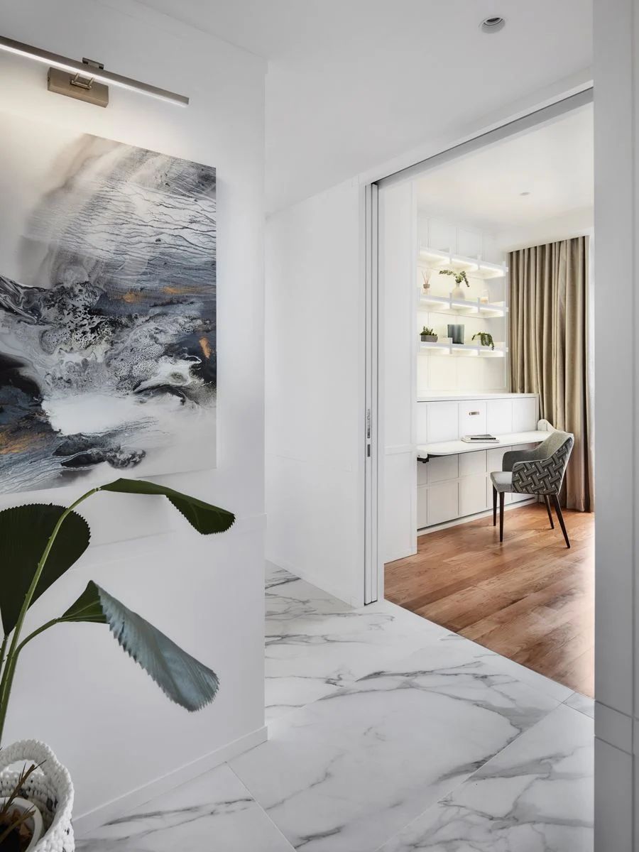 A view of the guest room, with the Murphy bed concealed behind the desk