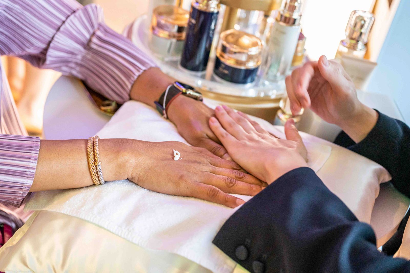 Hand massages from Cle de Peau Beauté during the event’s cocktail reception (Photo: Max Chan/Tatler)