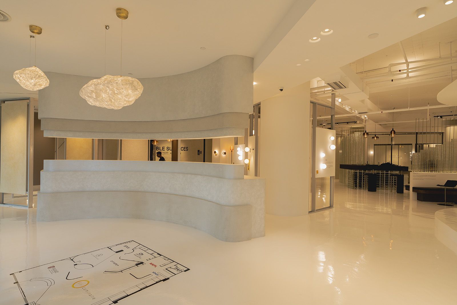 The lighting design at Rooms by Sol Luminaire elevates the shopping experience