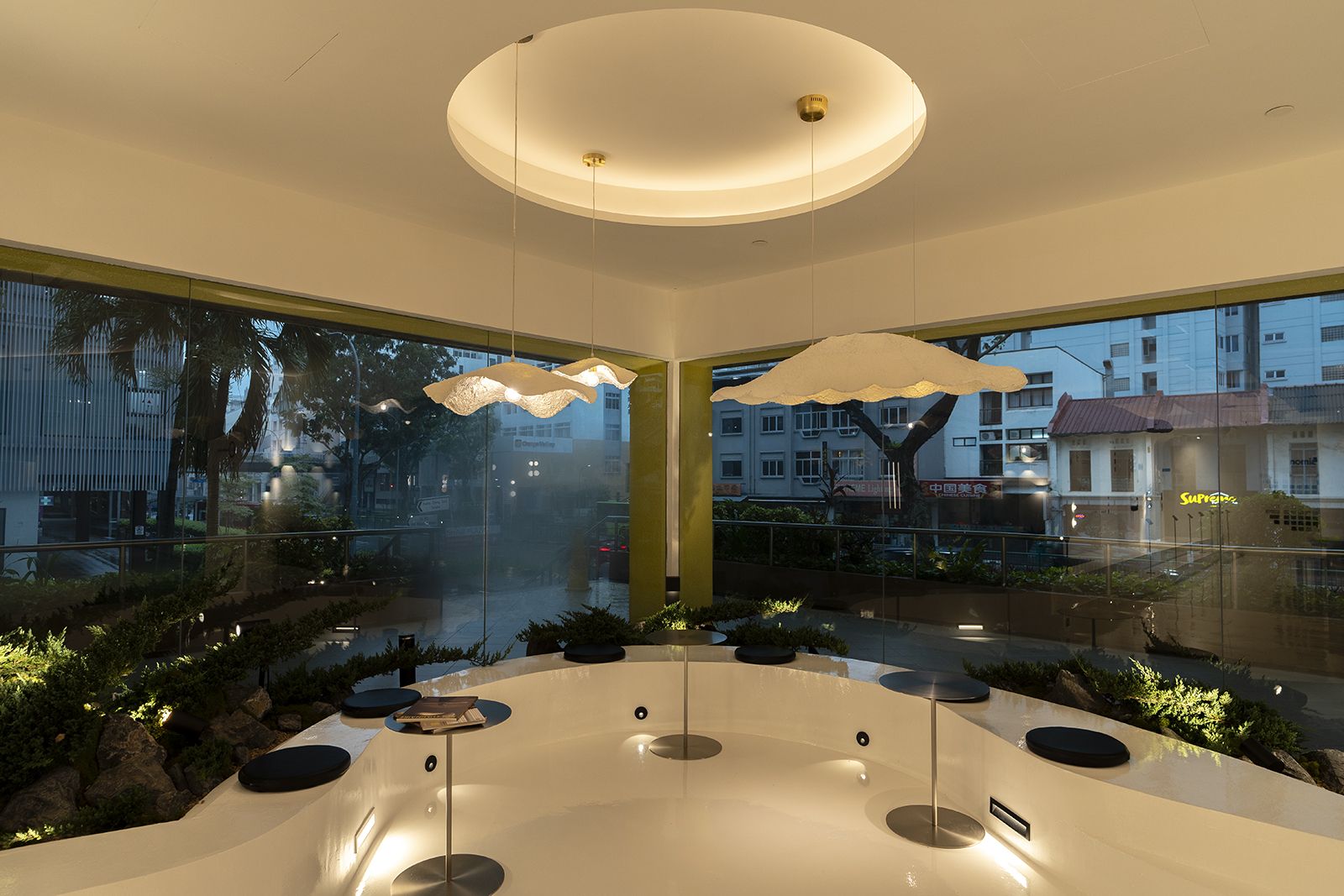 The boutique welcomes visitors with thoughtfully arranged displays, and carefully positioned lighting emphasising texture and quality