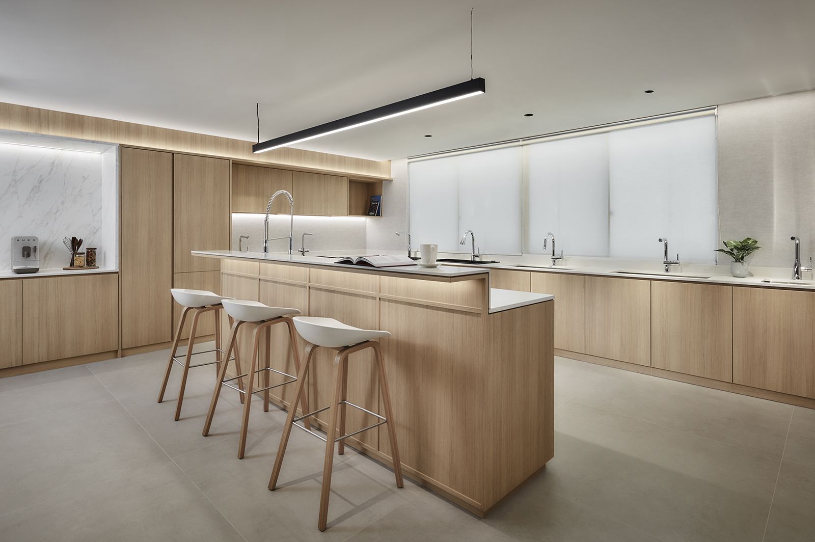 Inside the Grohe Kitchen, where clean lines and wood accents make a statement