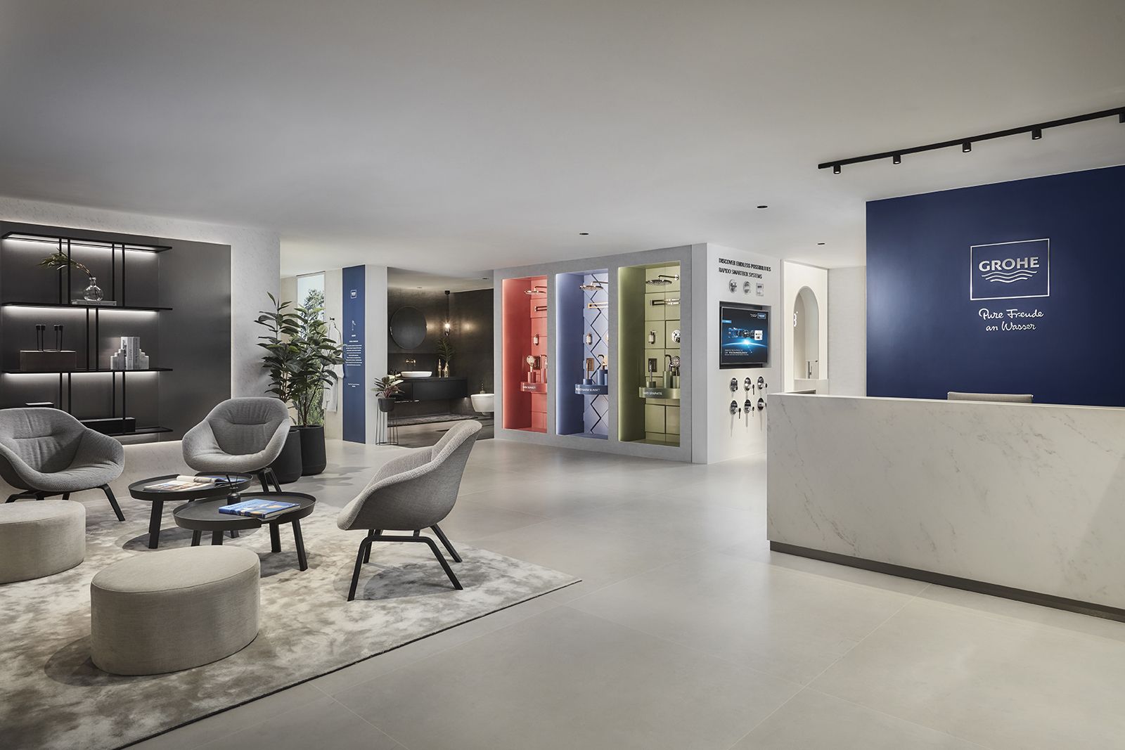 The Grohe Reception and Lounge features an airy, minimalist aesthetic