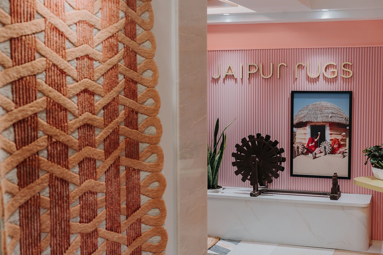 Jaipur Rugs’ pink entrance and fluted panels are a nod to its roots