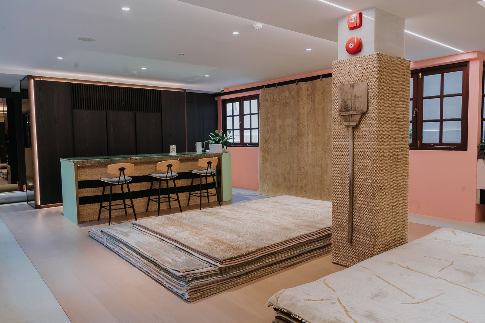 Rugs woven into columns and counters bring out a mix of artisanal heritage and modern design