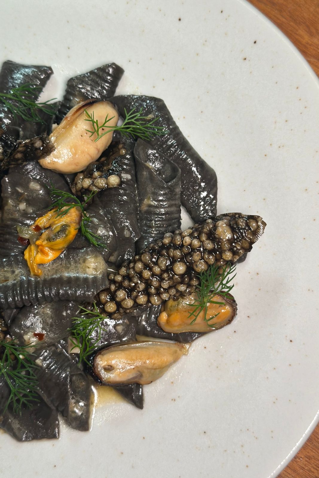 Squid ink garganelli with anchovy butter and mussels from Tandem in Legazpi Village