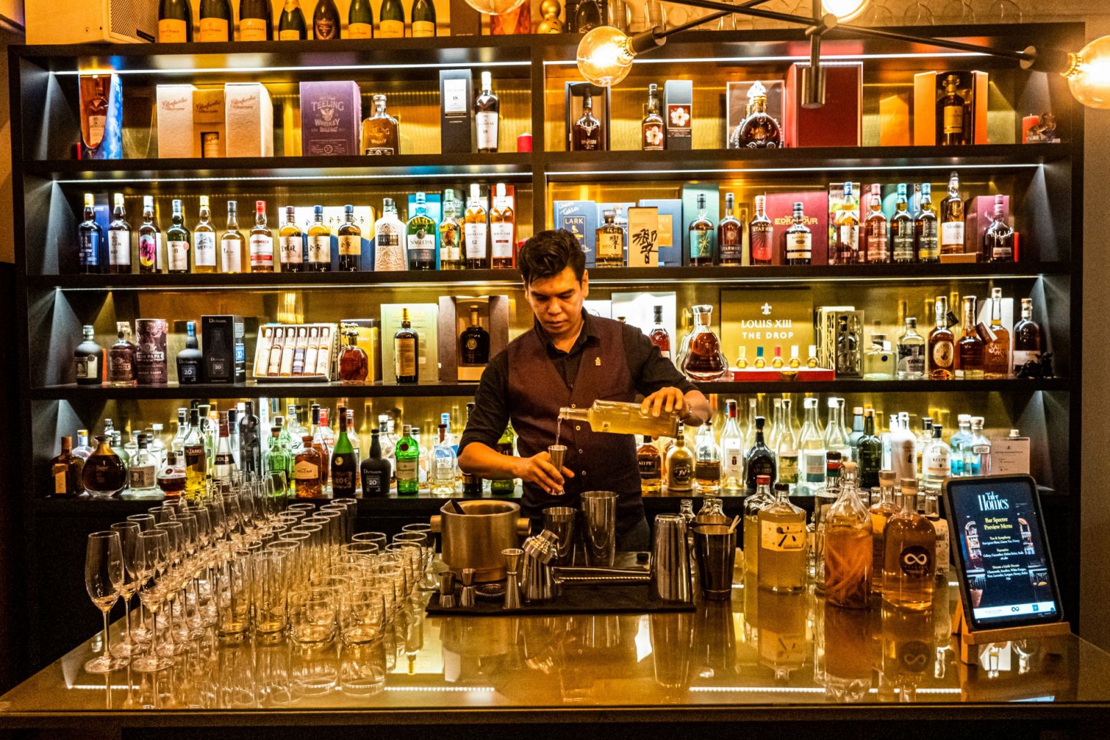 Andrew Pang, founder of Bar Spectre, taking over the Tatler Bar during the event