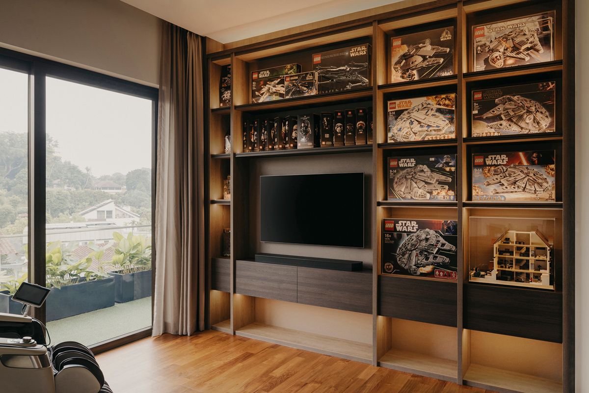The homeowner's Star Wars lego collection is neatly displayed in custom shelves