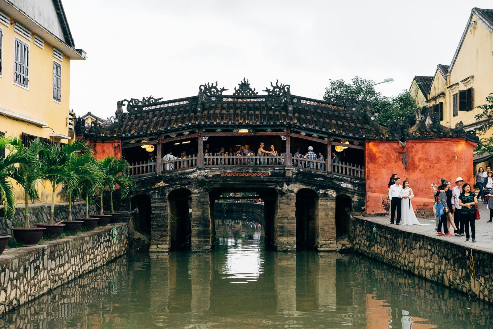 Beyond the lanterns of Hoi An (Photo: Photo by Markus Winkler: https://www.pexels.com/photo/a-bridge-over-a-canal-in-an-asian-city-20033279/