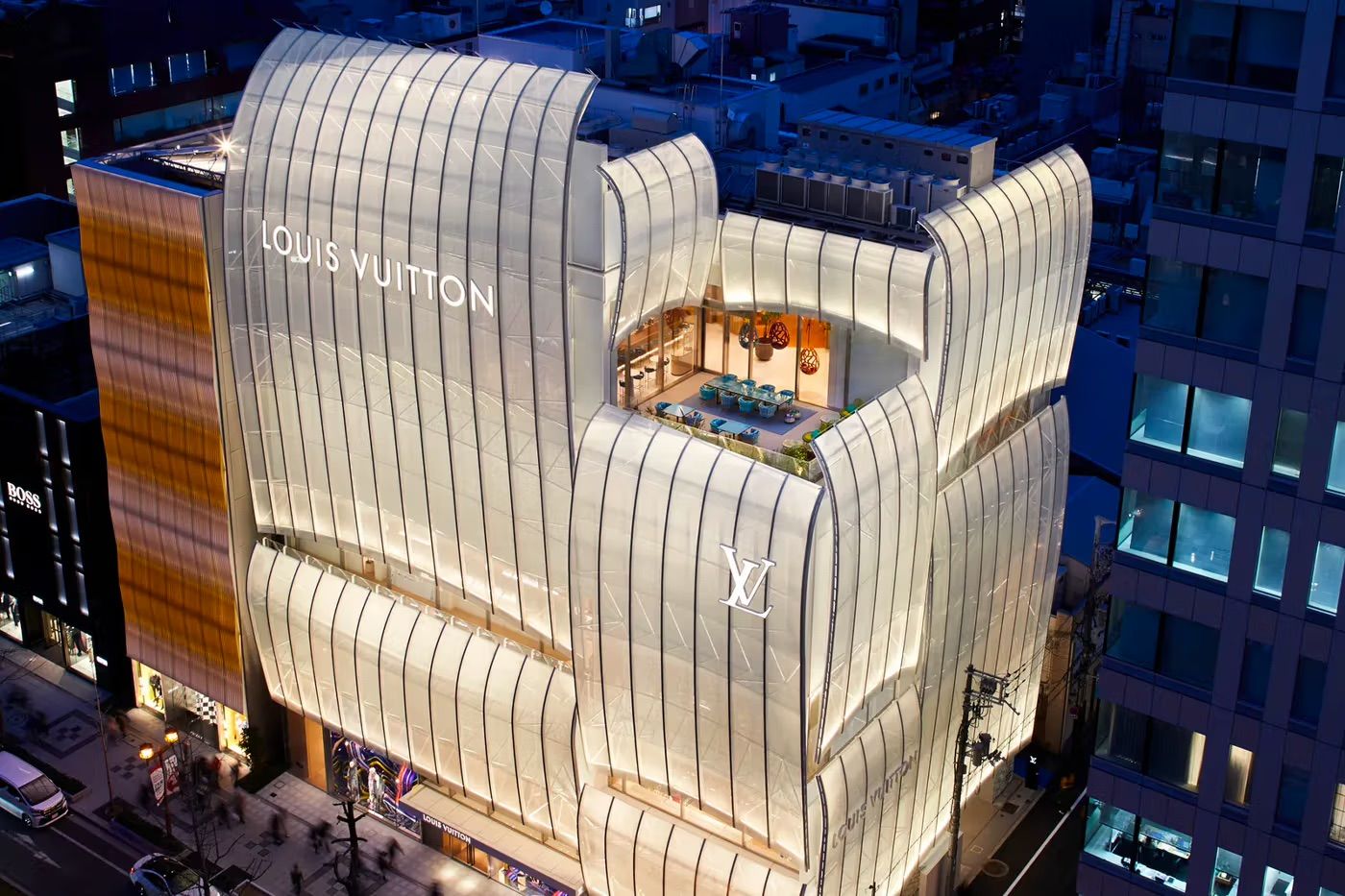 Jun Aoki’s magnificent undulating façade for the Louis Vuitton Osaka flagship glows ethereally against the night sky (Photo: Louis Vuitton)