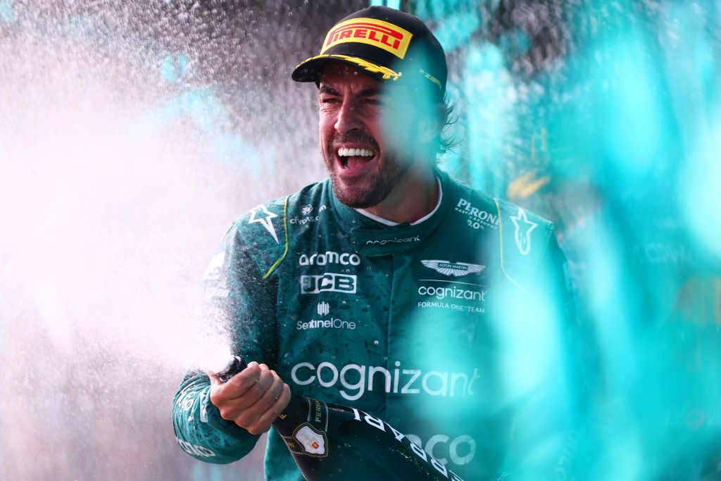 MIAMI, FLORIDA - MAY 07: Third placed Fernando Alonso of Spain and Aston Martin F1 Team celebrates on the podium after the F1 Grand Prix of Miami at Miami International Autodrome on May 07, 2023 in Miami, Florida. (Photo by Dan Istitene - Formula 1/Formula 1 via Getty Images)