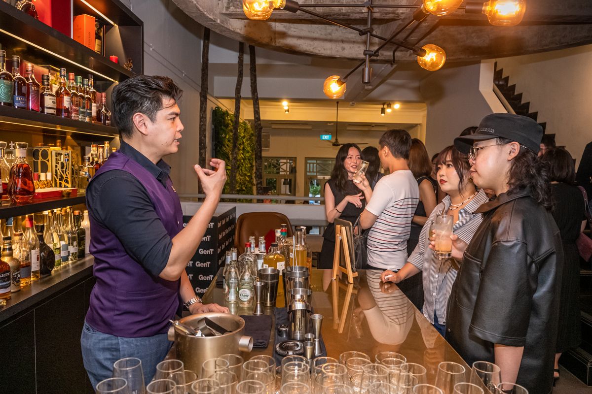 Andrew Pang sharing about Bar Spectre's TCM-inspired cocktails