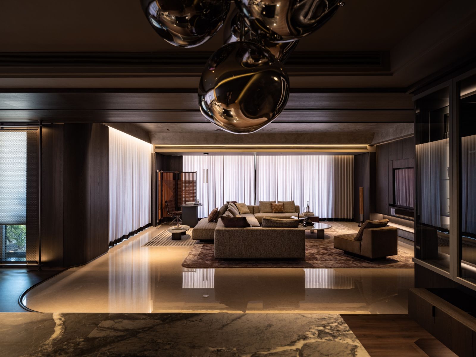 The open living area showcases the penthouse's expansive proportions