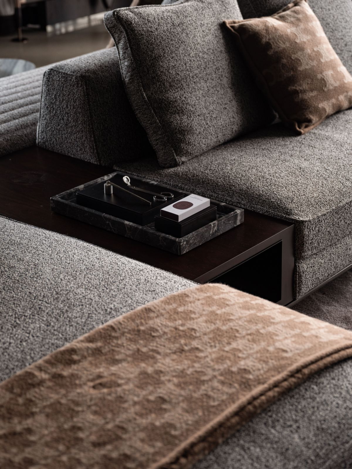 Close-up of the Minotti Roger Set sofa showing refined upholstery details and precise proportions