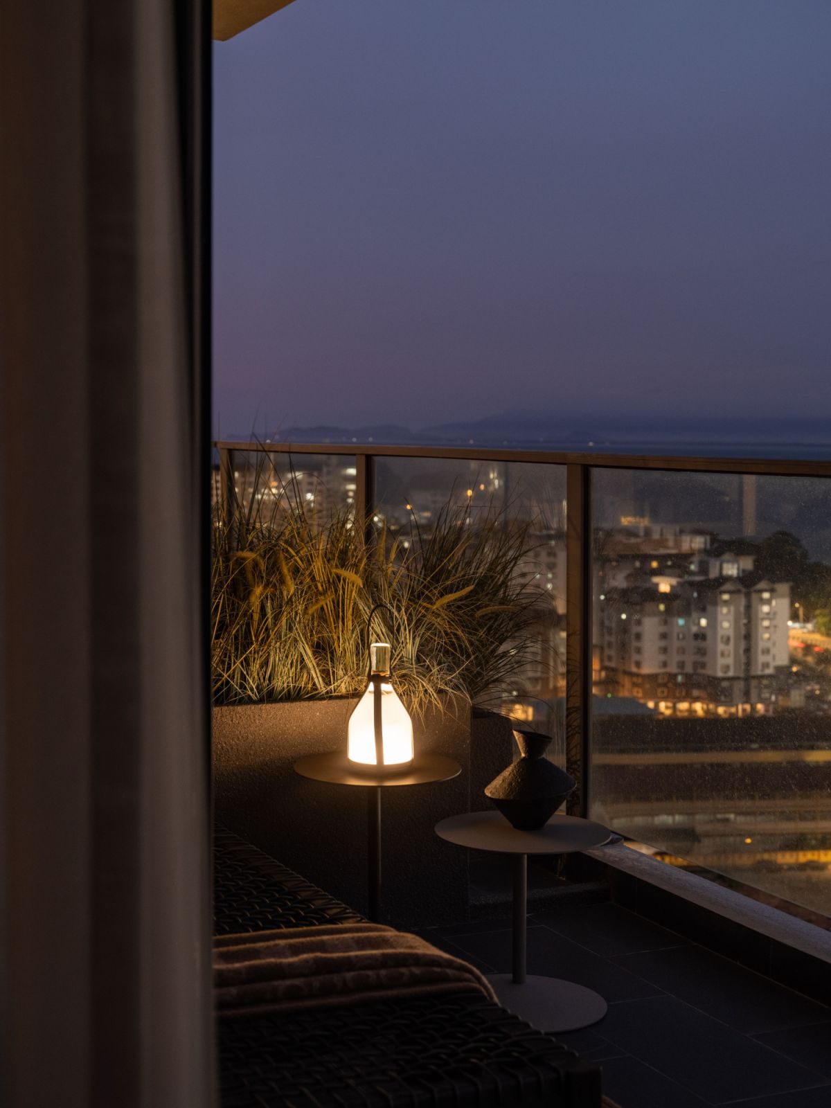 A corner of the balcony offers unobstructed views of Tanjung Tokong's coastline