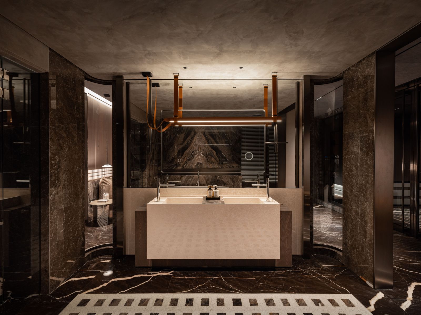 The oversized marble sink in the master bathroom combines functionality with visual impact
