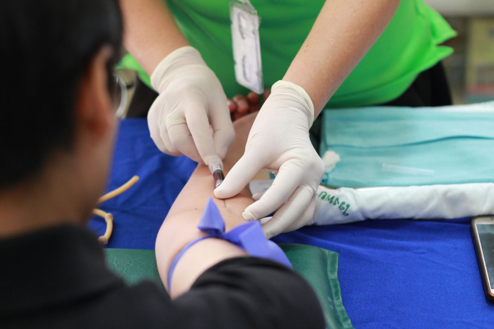 A person getting a blood check-up (Photo: Pexels.com/Pranidchakan Boonrom)