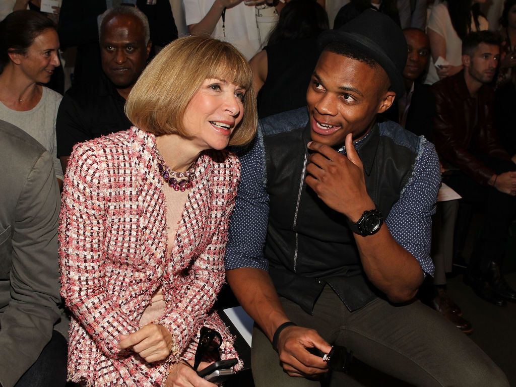 NEW YORK, NY - SEPTEMBER 06: Anna Wintour, editor-in-chief of American Vogue, talks with NBA's Russell Westbrook at the Rag & Bone Women's Collection show during Spring 2014 Mercedes-Benz Fashion Week at Skylight at Moynihan Station on September 6, 2013 in New York City. (Photo by Paul Morigi/WireImage)