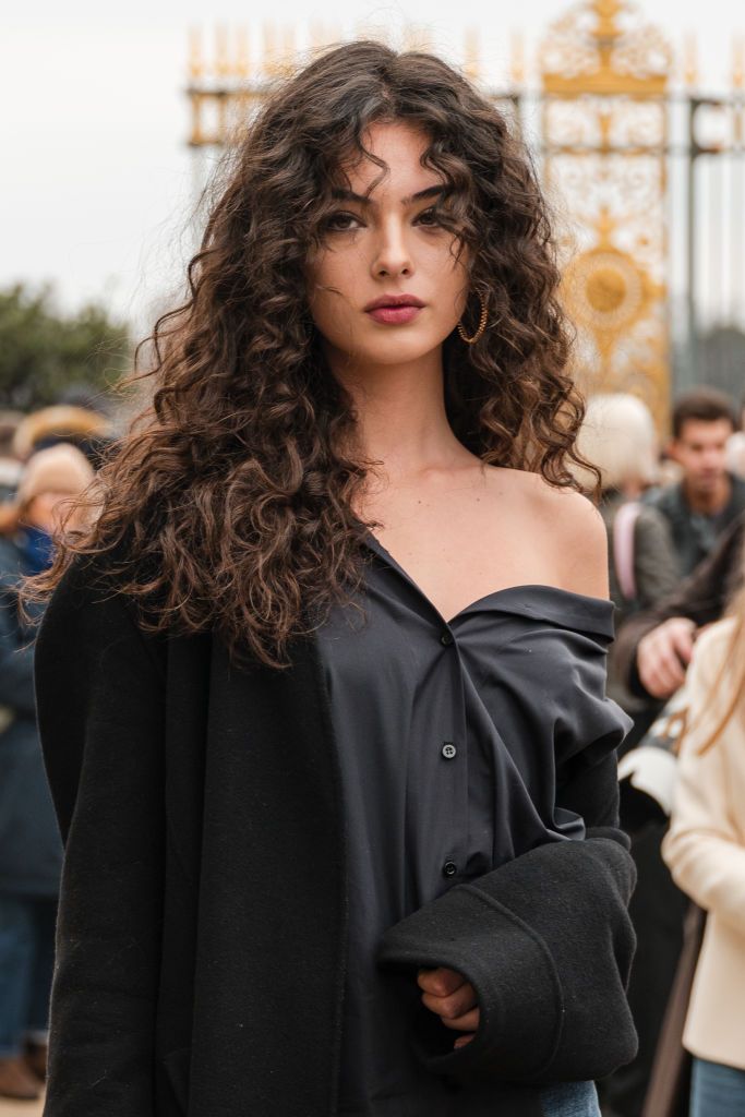 PARIS, FRANCE - FEBRUARY 27: Deva Cassel wears black shirt, black coat, outside Dior, during the Womenswear Fall/Winter 2024/2025 as part of Paris Fashion Week on February 27, 2024 in Paris, France. (Photo by Claudio Lavenia/Getty Images)