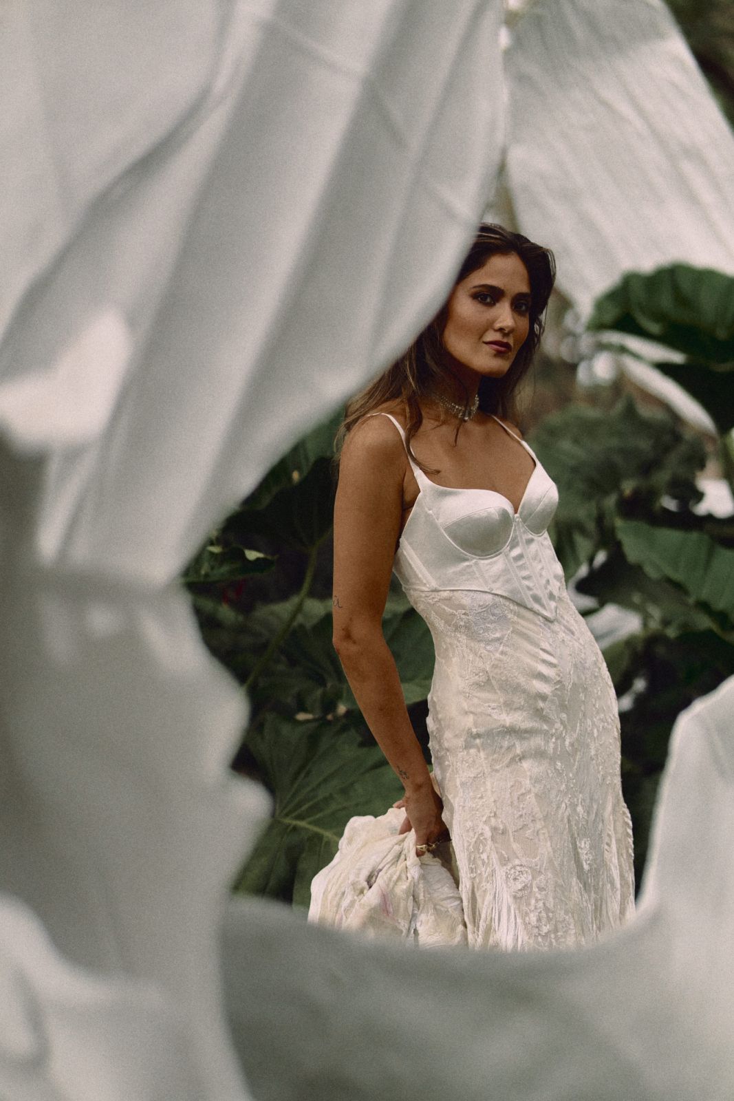 Kifu Augousti in a wedding gown by Olivier Theyskens