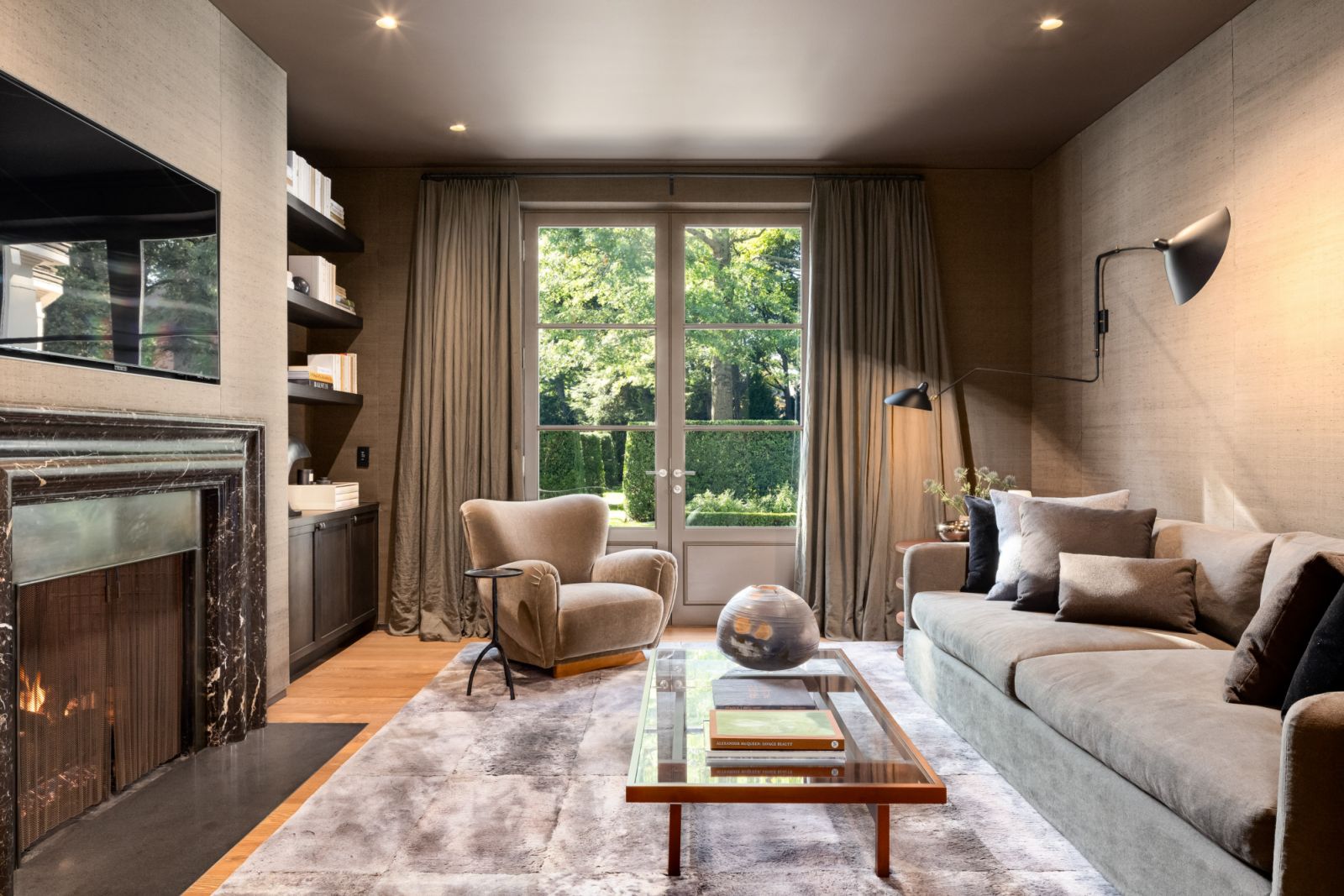 Marble and stone accents add sophistication and visual interest in the secondary living area