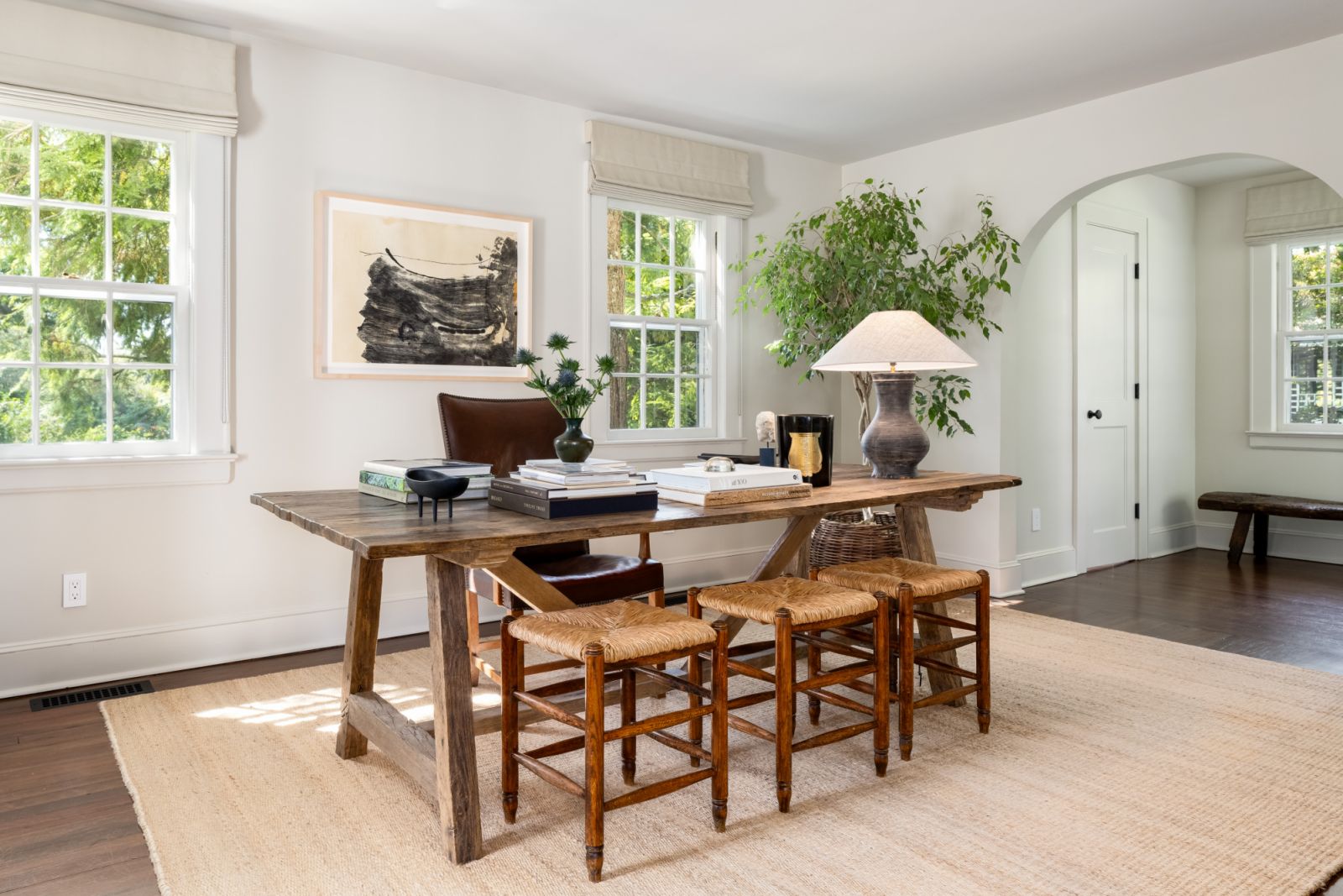 The refurbished guesthouse cottage echoes the overall design theme of the project