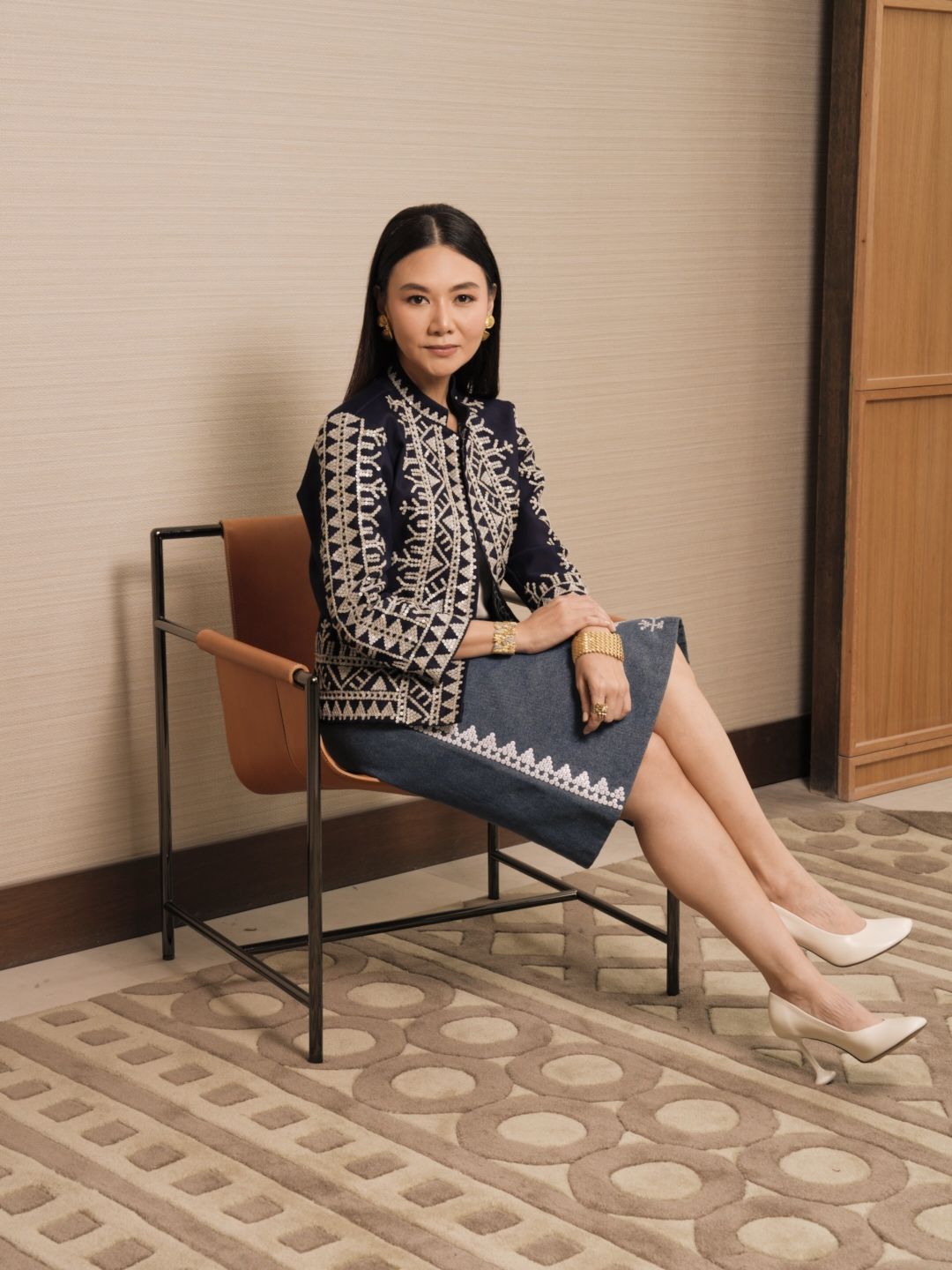 Kai Lim wears a navy embellished jacket and a denim skirt (Photo: Courtesy of Kaayo Modern Mindanao)