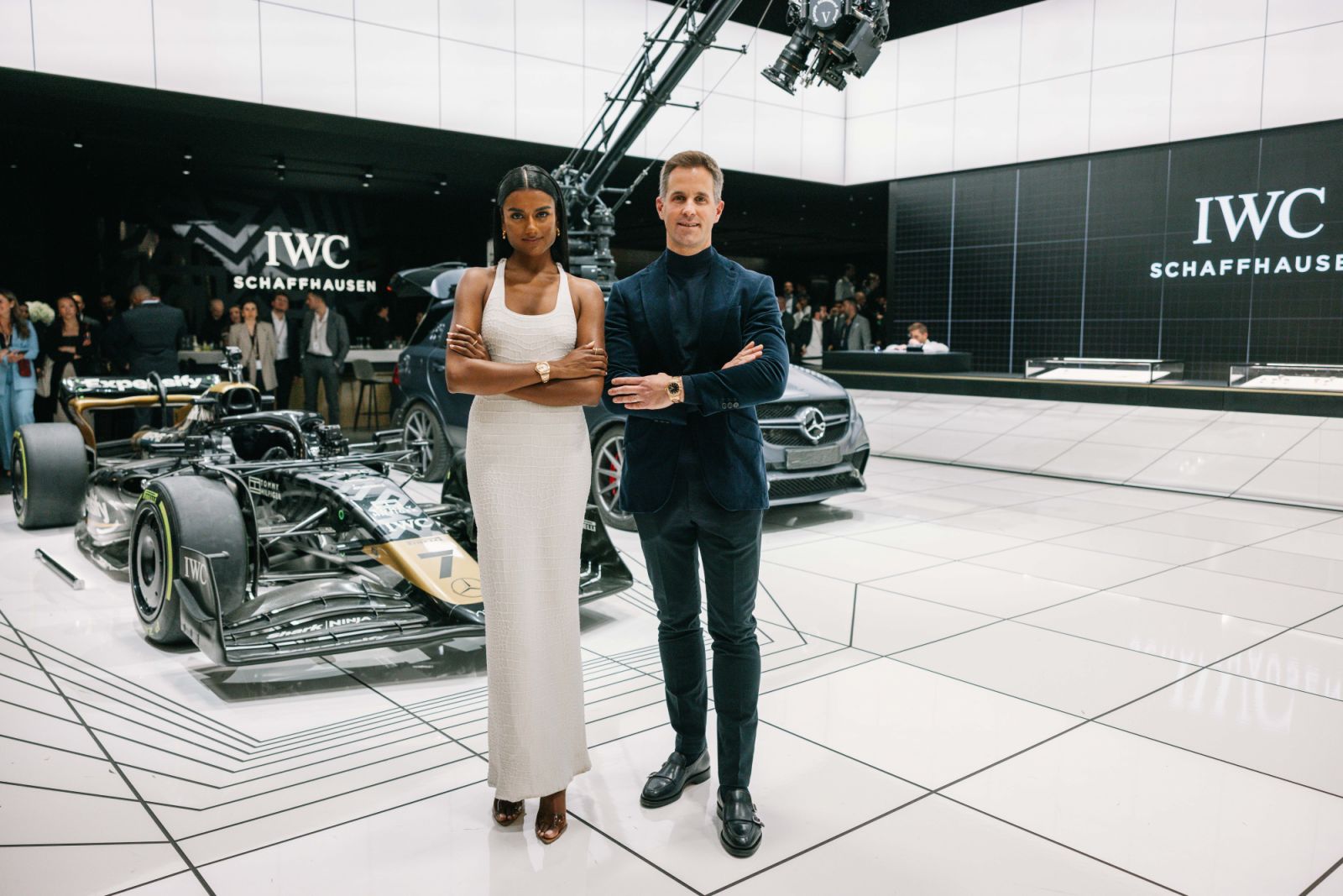 GENEVA, SWITZERLAND - APRIL 03: Simone Ashley and IWC Schaffhausen CEO Chris Grainger-Herrat the IWC Schaffhausen booth at Watches and Wonders Geneva on April 03, 2025 in Geneva, Switzerland. (Photo by Remy Steiner/Getty Images for IWC)