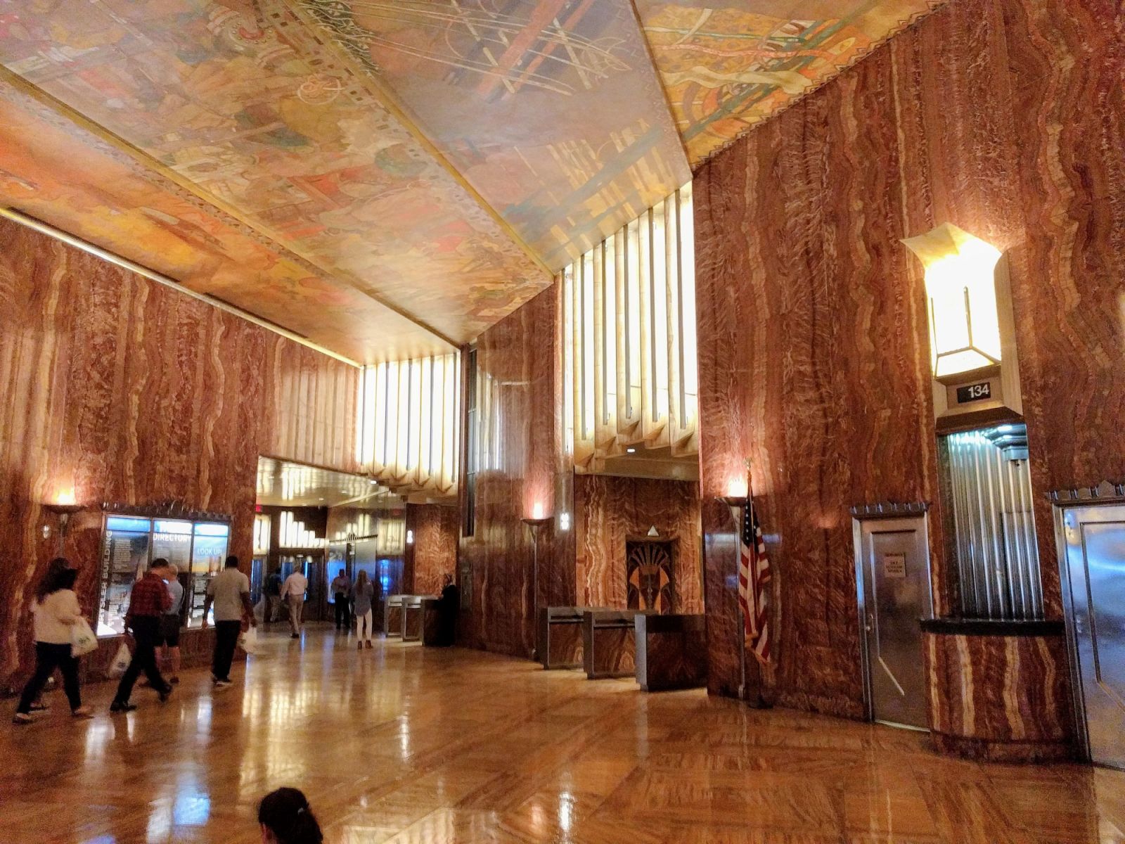 The lavish marble lobby featuring Edward Trumbull’s ceiling mural (Photo: WikiCommons)