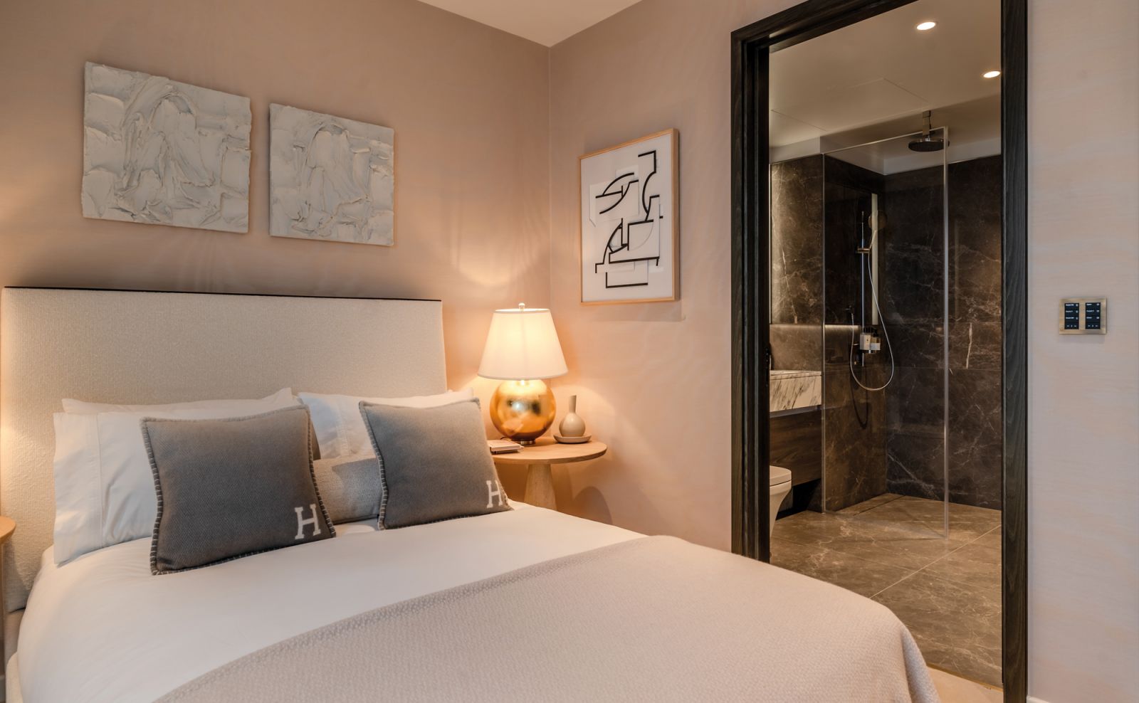 The second bedroom speaks of quiet luxury and timeless elegance